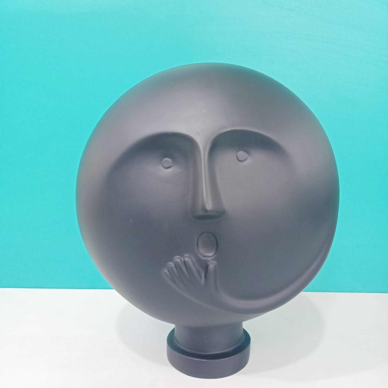 CLEVER CLAY MAN SCULPTURE